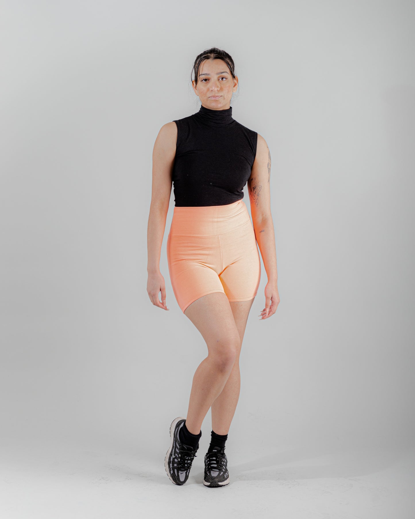 Short Fiora en maille de coton pêche fluo