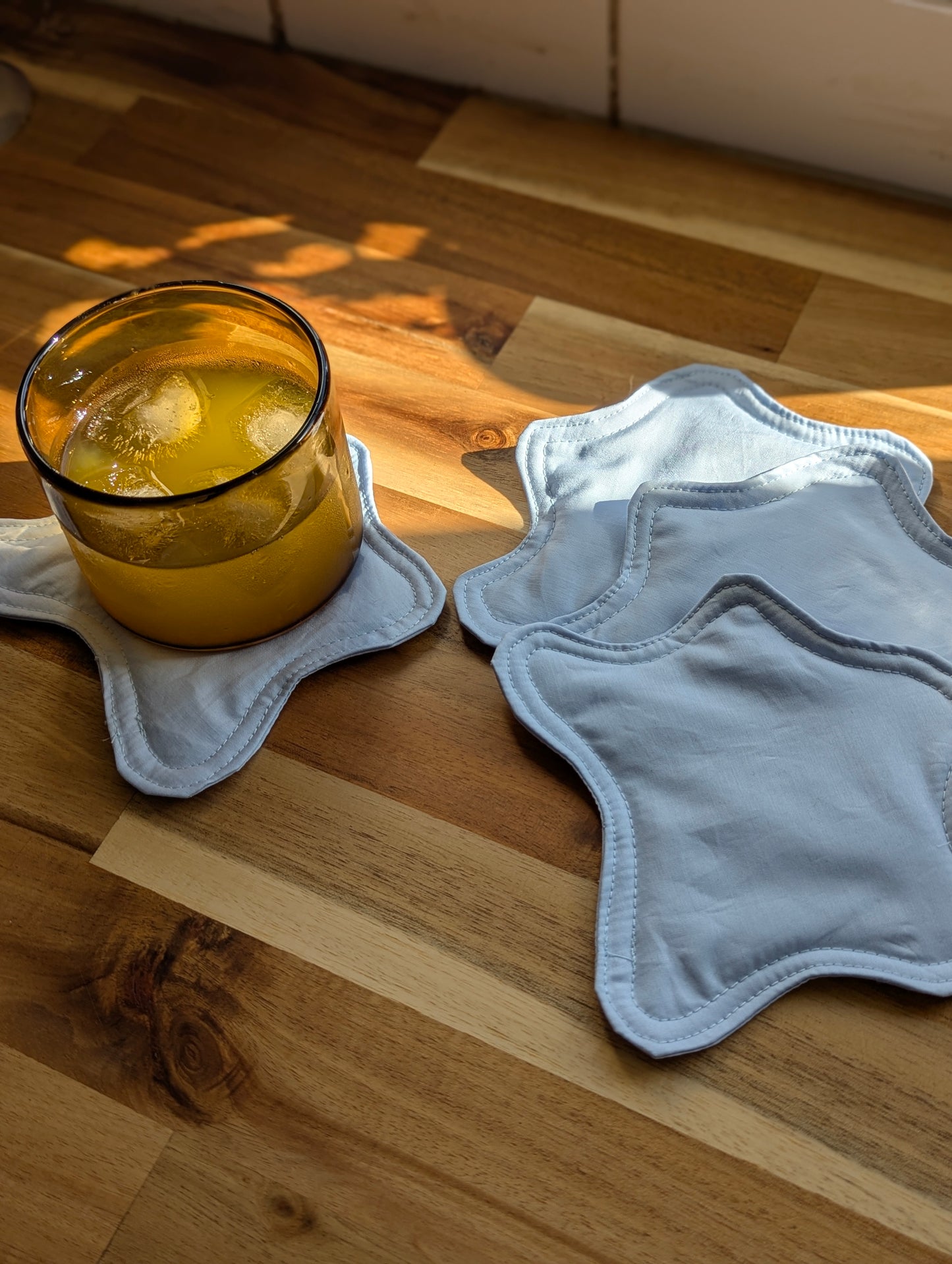 Dessous de verre Bouba en orange et bleu